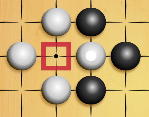 image of a ko fight, it is black's turn to move after white has taken the ko